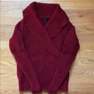 Red sweater.